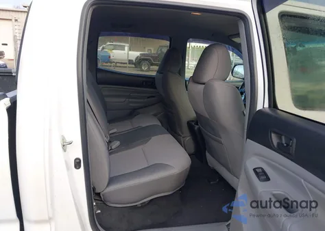 2015 Toyota Tacoma Base V6 z USA, uszkodzony, nr VIN 3TMMU4FN0FM082575